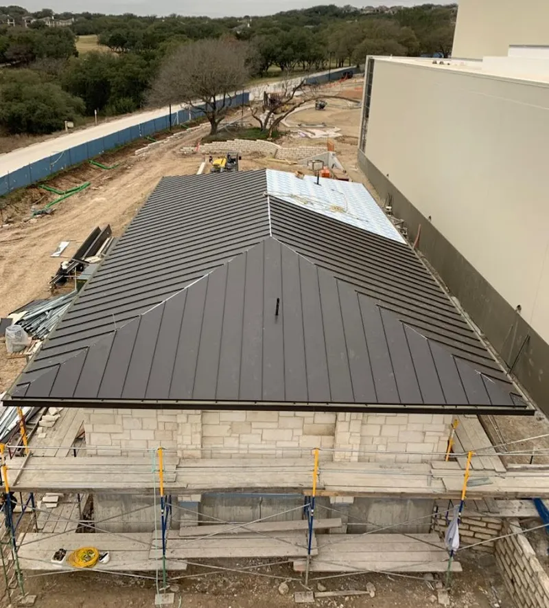 Metal roof new construction with scaffolding in Bonadelle Ranchos